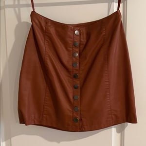 Tan leather mini skirt